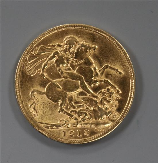 A George V 1913 gold full sovereign.